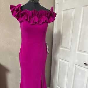 Brand new fuschia colored dress NWT from Macys. It has a beautiful lining inside